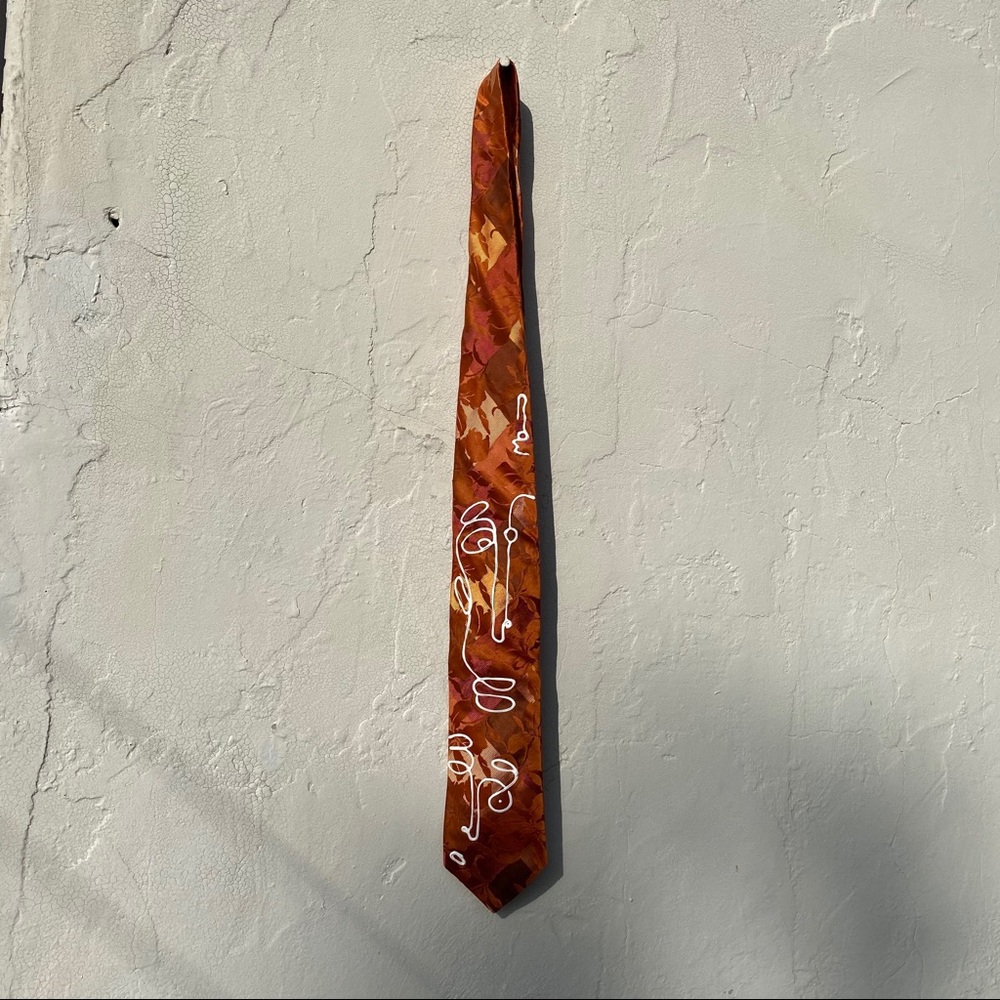 Stylistically vintage floral and pattern satin tie